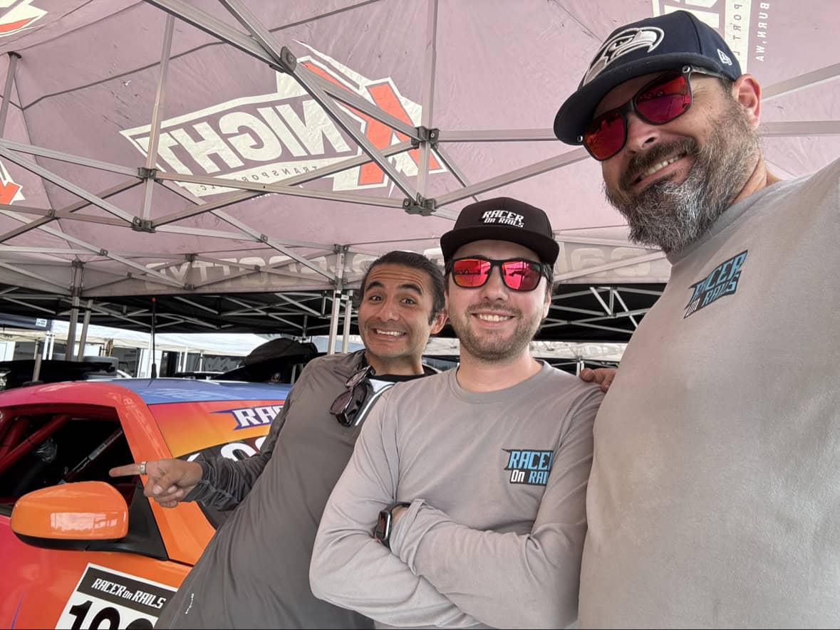Gama, Jack and Tyler selfie under the Knight Transport tent
